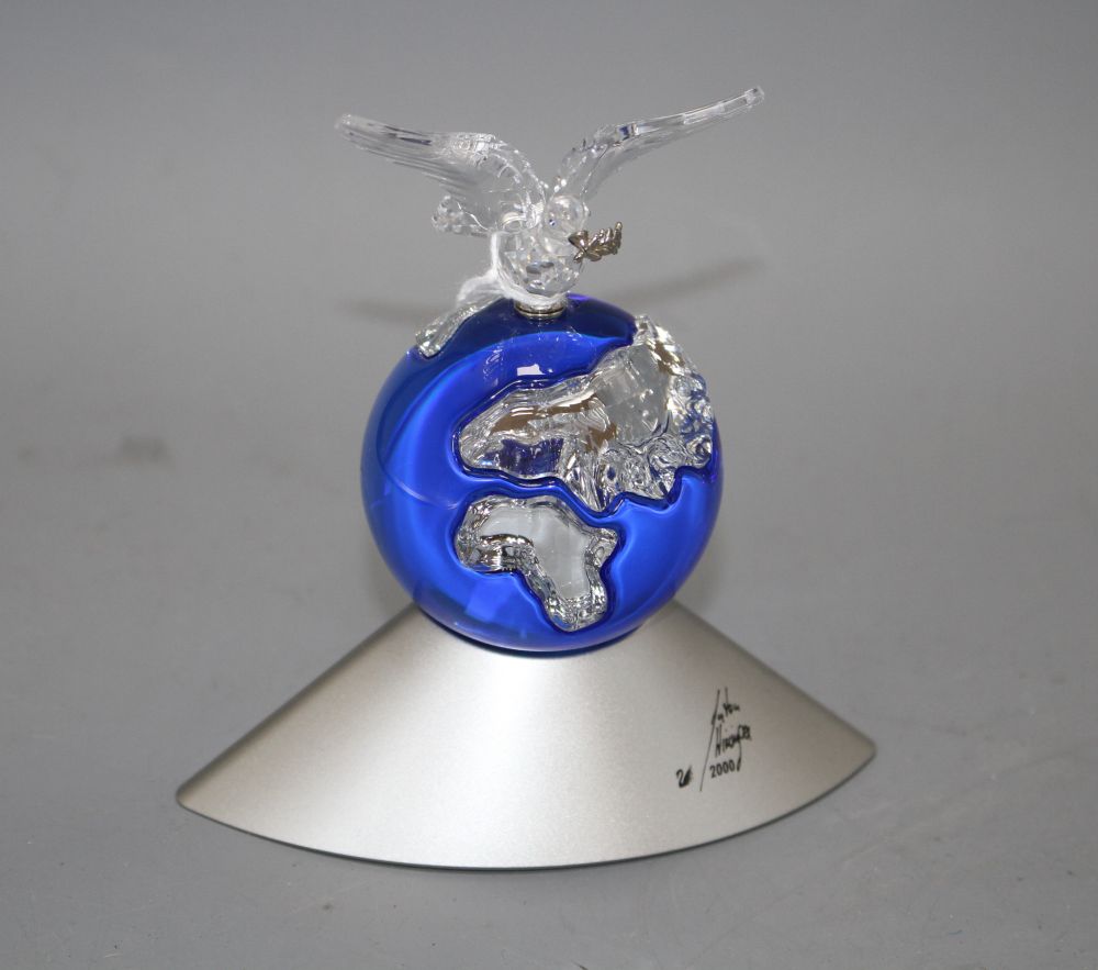 A Swarovski Crystal ornament Planet Vision 2000, in original box with certificate, overall height 12cm